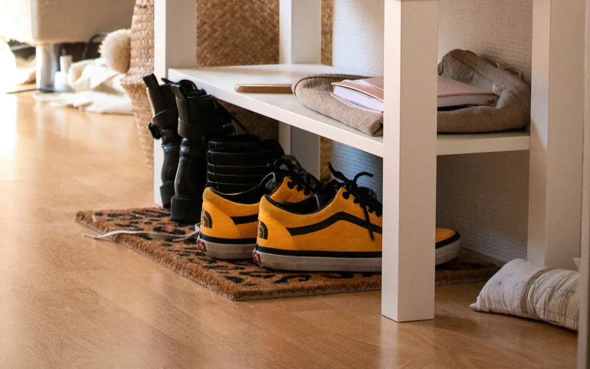 Shoes arranged in open storage compartments